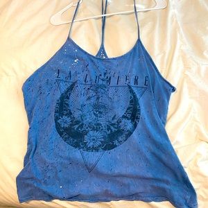 Women’s torn blue tank top